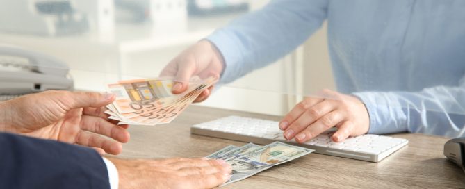 man exchanging money