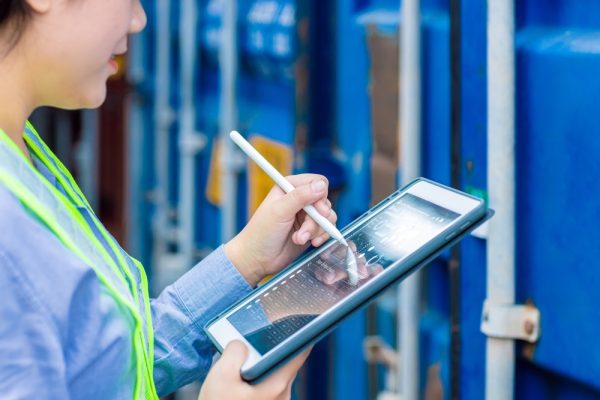 Closeup Logistic Worker Industry Tablet